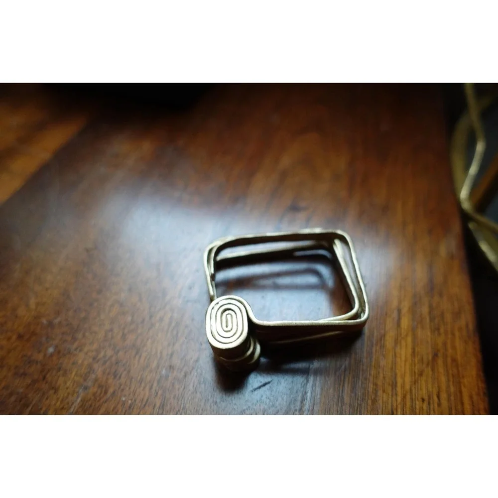 set of 4 Vintage napkin rings metal brass with swirl rectangular‎ design